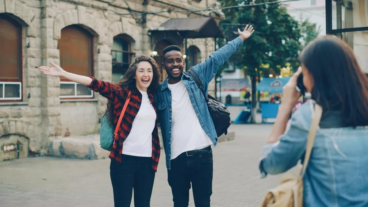 Happy young couple celebrating financial freedom together